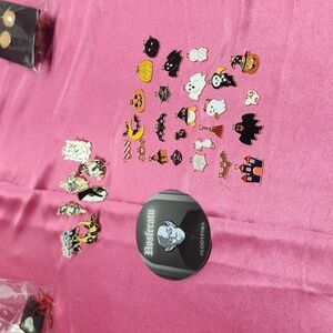 Lot of Halloween pins and charms total items are 33 pieces